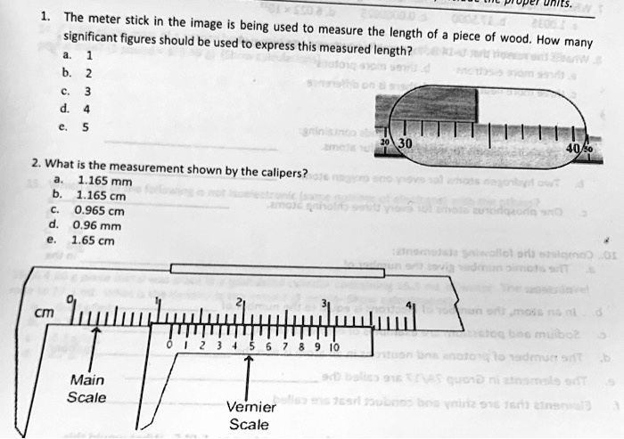 The meter stick in the image is being used to measure the length of a ...
