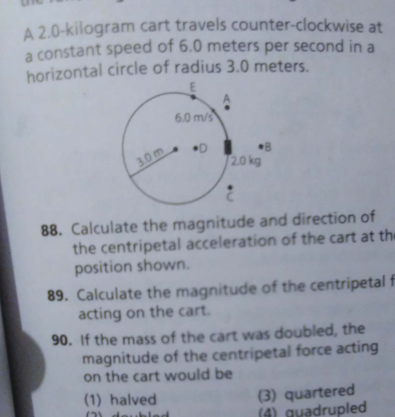 A 2.0kilogram cart travels counterclockwise at a constant speed of 6.