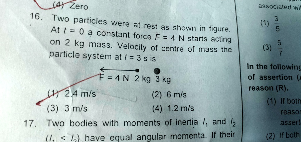 two particles were at rest as shown in the figure at t 0 is equal to ...