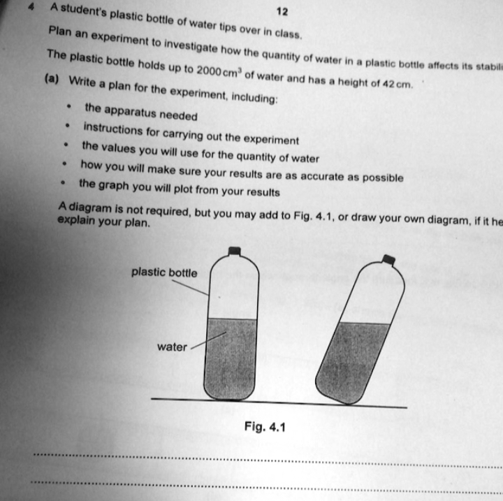 12 A student's plastic bottle of water tips over in...
