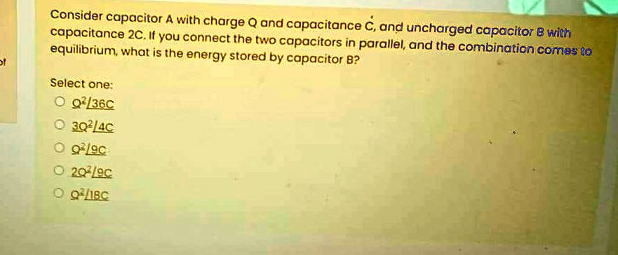 SOLVED: Consider capacitor A with charge Q and capacitance C, and ...