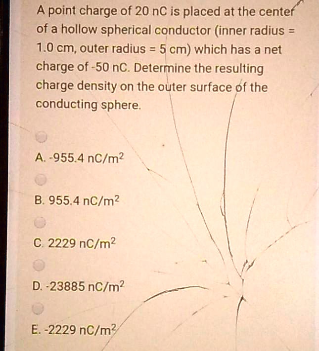 a point charge of 20 nc is placed at the centef of a hollow spherical ...