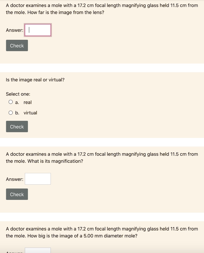 SOLVEDA doctor examines a mole with a 17.2 cm focal length magnifying