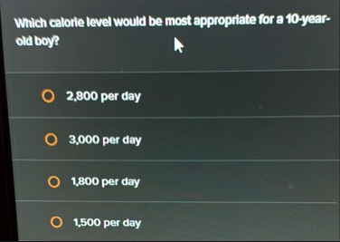which calorie level would be most appropriate for a 10 year old boy 2800 per day 3000 per day 1800 per day 1500 per day 82286