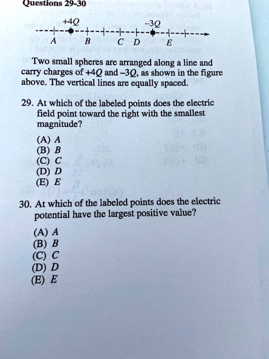 Questions 29-30 +4Q 30 Two small spheres are arranged along line and ...