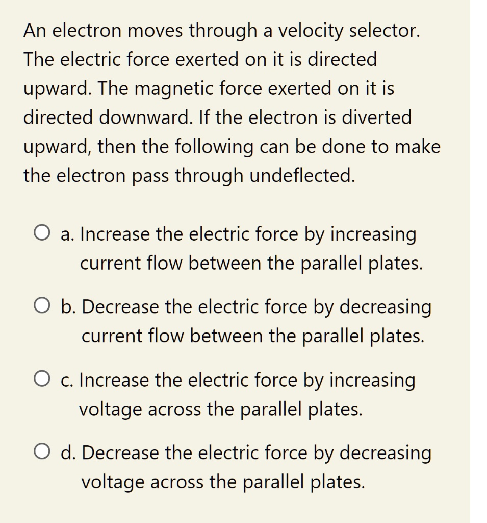 SOLVED:An electron moves through a velocity selector: The electric ...