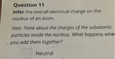 infer the overall electric charge on the nucleus of an atom