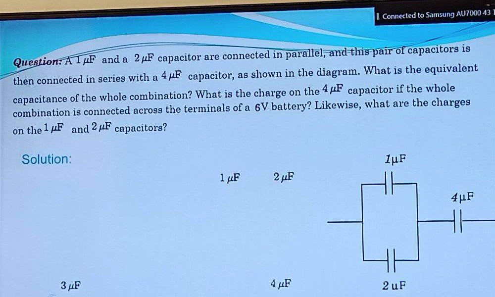 SOLVED Question A1 1 F and a 2 μF capacitor are connected in parallel