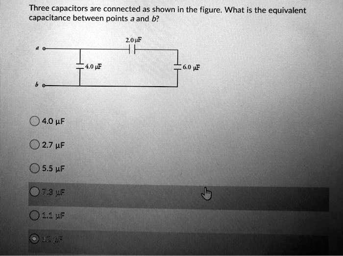 Three capacitors are connected as shown in the figure… SolvedLib