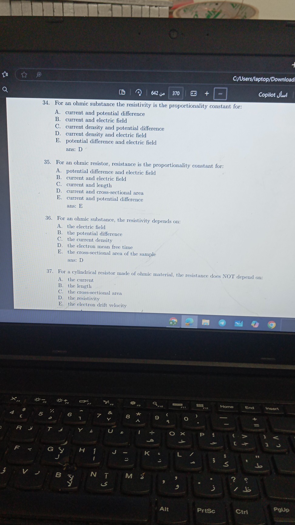 C//Users/laptop/Download 642 us 370 Copilot ??? 34. For an ohmic ...