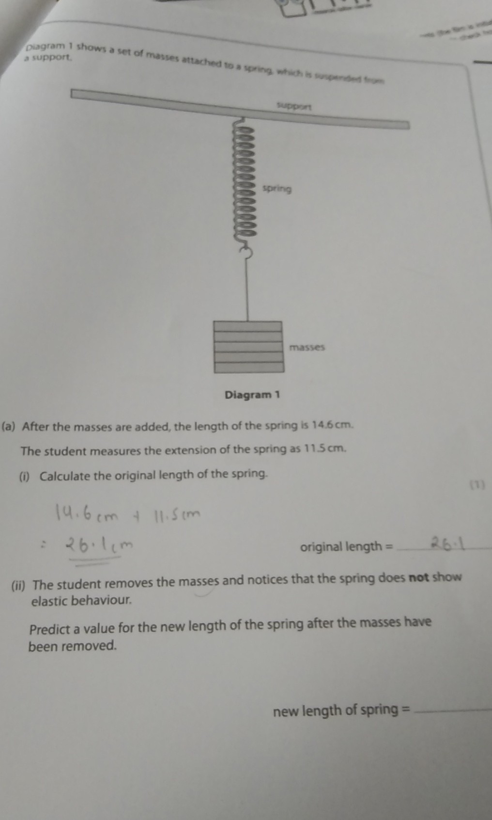 Diagram 1 shows a set of masses attached to a spring which is ...