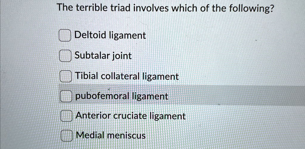 The terrible triad involves which of the following? Deltoid ligament ...