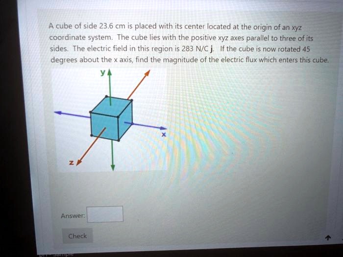 SOLVED:A cube of side 23.6 cm is placed with its center located at the ...
