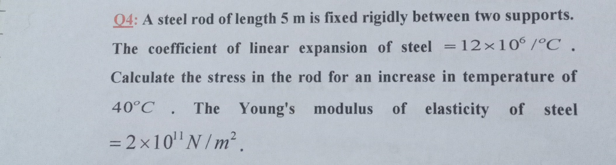 SOLVED Q4 A steel rod of length 5 m is fixed rigidly between two