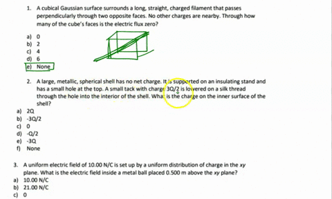 a-cubical-gaussian-surface-surrounds-long-straight-charged-filament-that-passes-perpendicularly-through-two-opposite-faces-no-other-charges-are-nearby_-through-how-many-of-the-cube-faces-is-10544