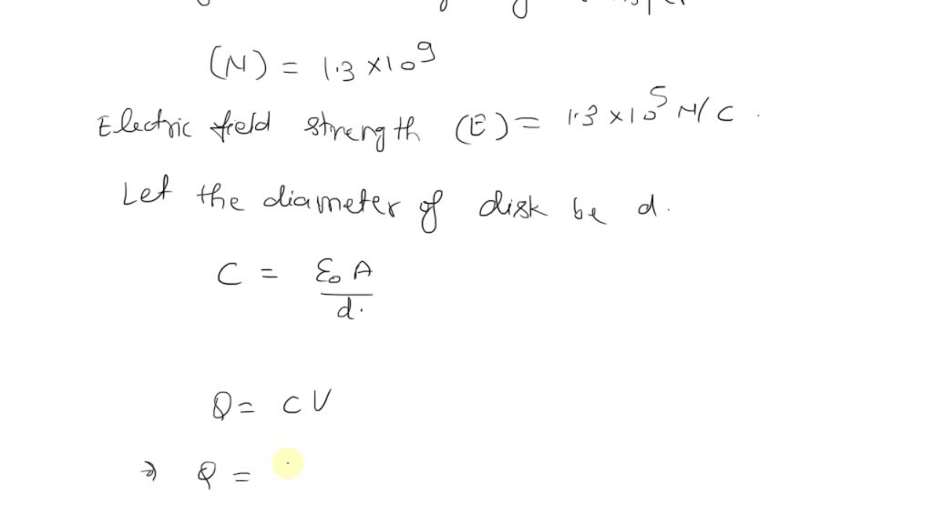 SOLVED: Two circular disks spaced 0.50 mm apart form a parallel-plate ...