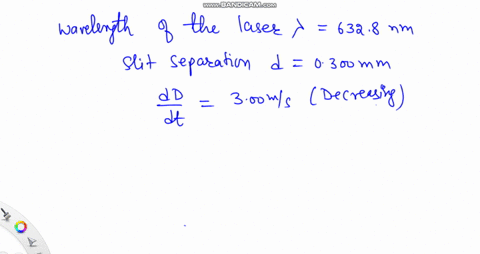 a-student-holds-a-laser-that-emits-light-of-wavelength-6328-mathrmnm-the-laser-beam-passes-through-a